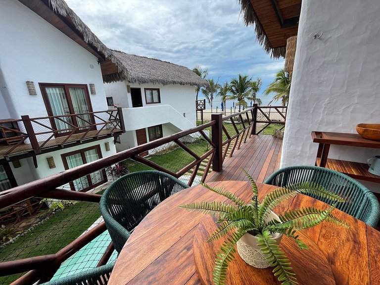 Ap. Vila Mar Pé na areia com vista para o mar e piscina