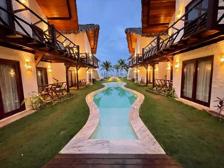 Ap. Vila Mar Pé na areia com vista para o mar e piscina