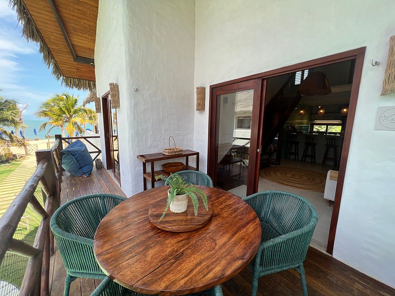 Ap. Vila Mar Pé na areia com vista para o mar e piscina