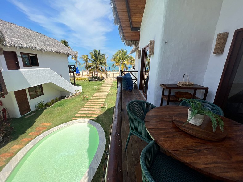 Ap. Vila Mar Pé na areia com vista para o mar e piscina