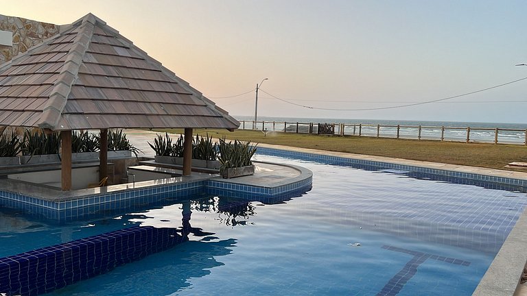 Casa de luxo em condomínio pé na areia com 4 suítes, roftoop