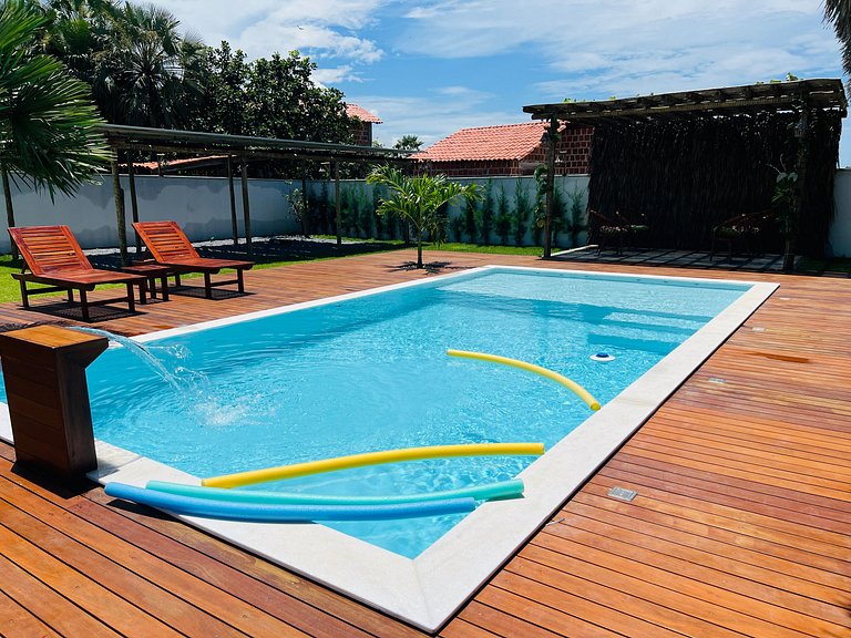 Suíte dupla em condomínio novo com piscina e café da manhã